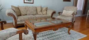 Sofa with coffee table and chairs 